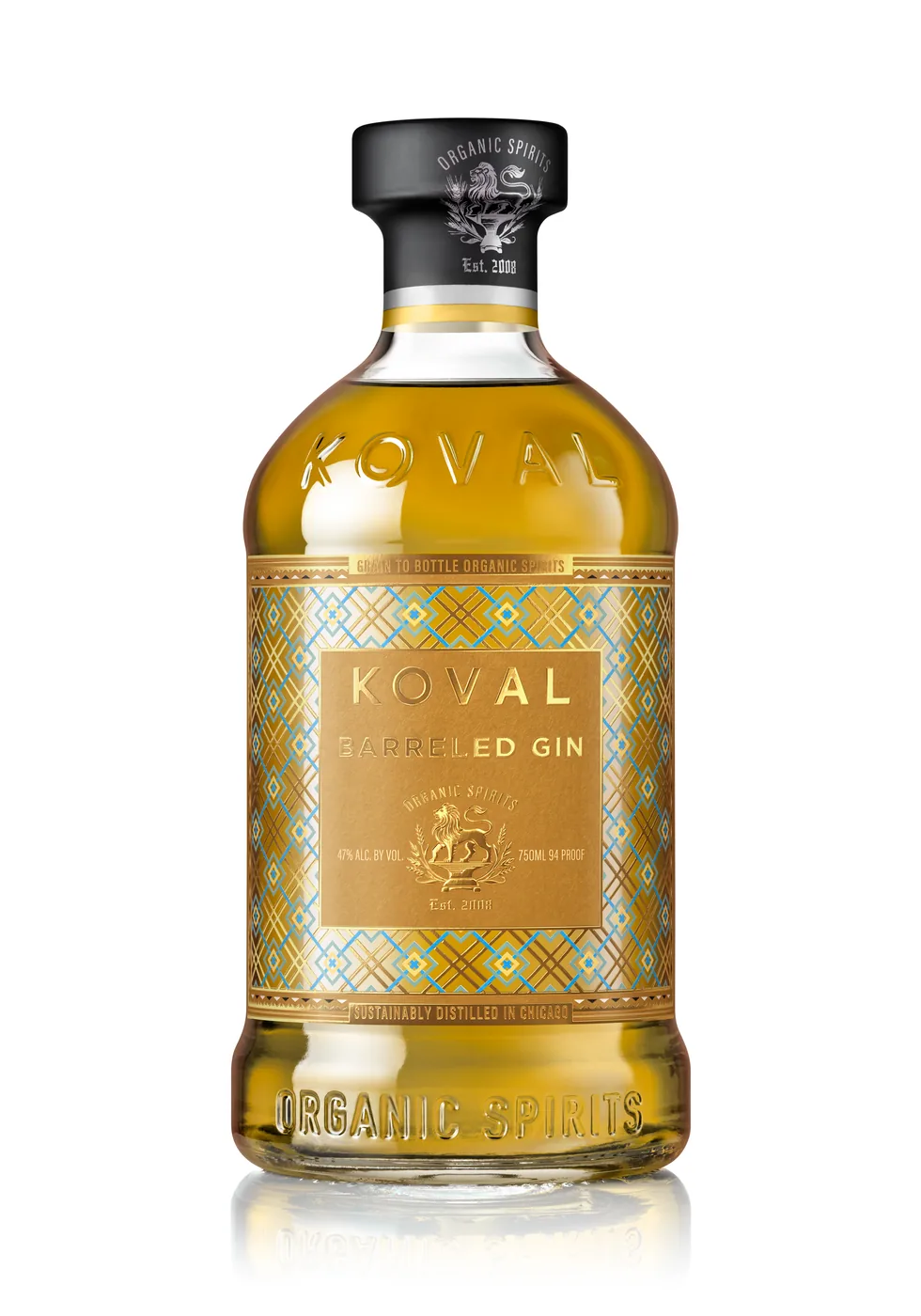 Bottle of KOVAL Barreled Gin, a 94 proof organic craft gin aged in whiskey barrels and named Best Wood-Aged Gin in 2023, rated 87 points by Wine Enthusiast.